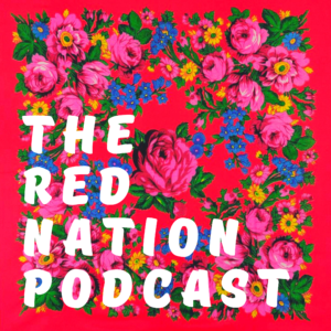 The Red Nation podcast in white text  over a background with a red base and pink, yellow, blue, and green flowers